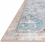 Old soul, new spirit. Power-loomed of 100% polyester, the Wynter Teal / Multi area rug showcases a one-of-a-kind vintage or antique area rug look at an affordable price. This rug brings in tones of blue, ivory, and pink and ideal for high traffic areas due to the rug's durability. The rug is perfect for living rooms, dining rooms, kitchens, hallways, and entryways.  Power Loomed 100% Polyester WYN-06 Teal/Multi Colors: Blue, Ivory, Pink