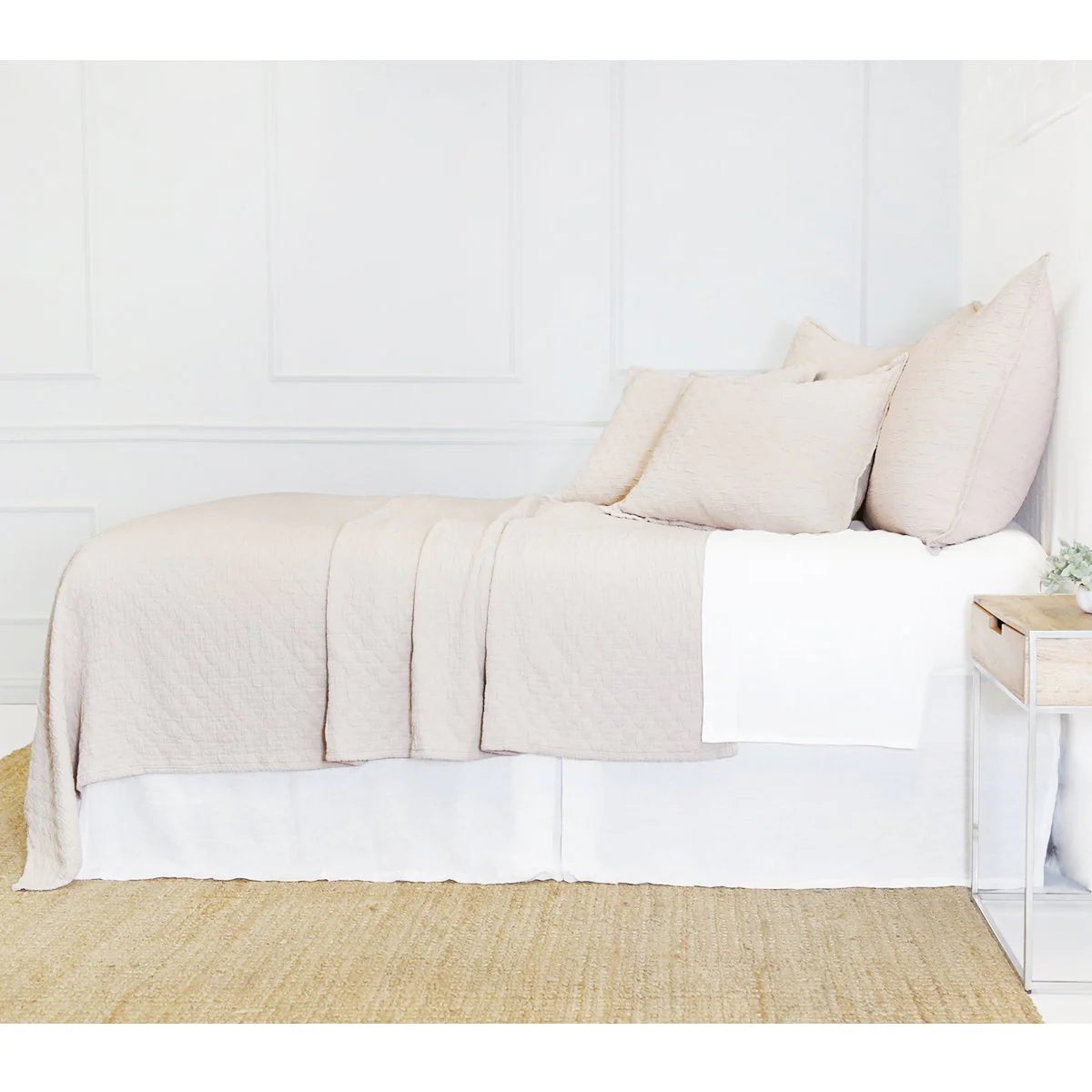 Crafted in Portugal, the Ojai matelasse by Pom Pom at Home is light and casual, bringing comfort with its subtle diamond pattern. The coziest bedding to climb into after a long day.  King lounger 100% cotton. Amethyst Home provides interior design, new home construction design consulting, vintage area rugs, and lighting in the Dallas metro area.