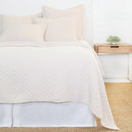 Crafted in Portugal, the Ojai matelasse by Pom Pom at Home is light and casual, bringing comfort with its subtle diamond pattern. The coziest bedding to climb into after a long day.  King lounger 100% cotton. Amethyst Home provides interior design, new home construction design consulting, vintage area rugs, and lighting in the Des Moines metro area.