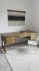 It's a material thing. Made entirely from solid pine, a specialized waxed finish gives this roomy five-drawer desk a purposefully antiqued look. Amethyst Home provides interior design, new home construction design consulting, vintage area rugs, and lighting in the Winter Garden metro area.