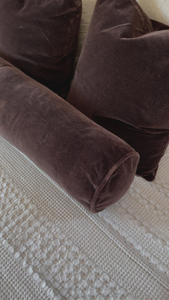 A long, chocolate-colored bolster pillow elevates beds and sofas in an instant. Crafted from saturated wool velvet, for a sustainable alternative to mohair, with a hidden zipper for a smooth silhouette.Overall Dimensions: 48.00"w x 8.00"d x 8.00"hWeight : 5.51 lbsMaterials : 50% Viscose, 50% Wool Amethyst Home provides interior design, new home construction design consulting, vintage area rugs, and lighting in the Monterey metro area.