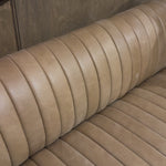 The beauty of this modular piece is that the vertical channeling makes for a cohesive feel despite being modular. Your new favorite place to enjoy morning coffee. A U-shaped dining banquette is upholstered in tan top-grain leather with a beautifully pronounced grain and dramatic channeling for a linear look.Overall Dimensions: 119.50"w x 66.50"d x 31. Amethyst Home provides interior design, new home construction design consulting, vintage area rugs, and lighting in the Calabasas metro area.