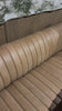 The beauty of this modular piece is that the vertical channeling makes for a cohesive feel despite being modular. Your new favorite place to enjoy morning coffee. A U-shaped dining banquette is upholstered in tan top-grain leather with a beautifully pronounced grain and dramatic channeling for a linear look.Overall Dimensions: 119.50"w x 66.50"d x 31. Amethyst Home provides interior design, new home construction design consulting, vintage area rugs, and lighting in the Calabasas metro area.