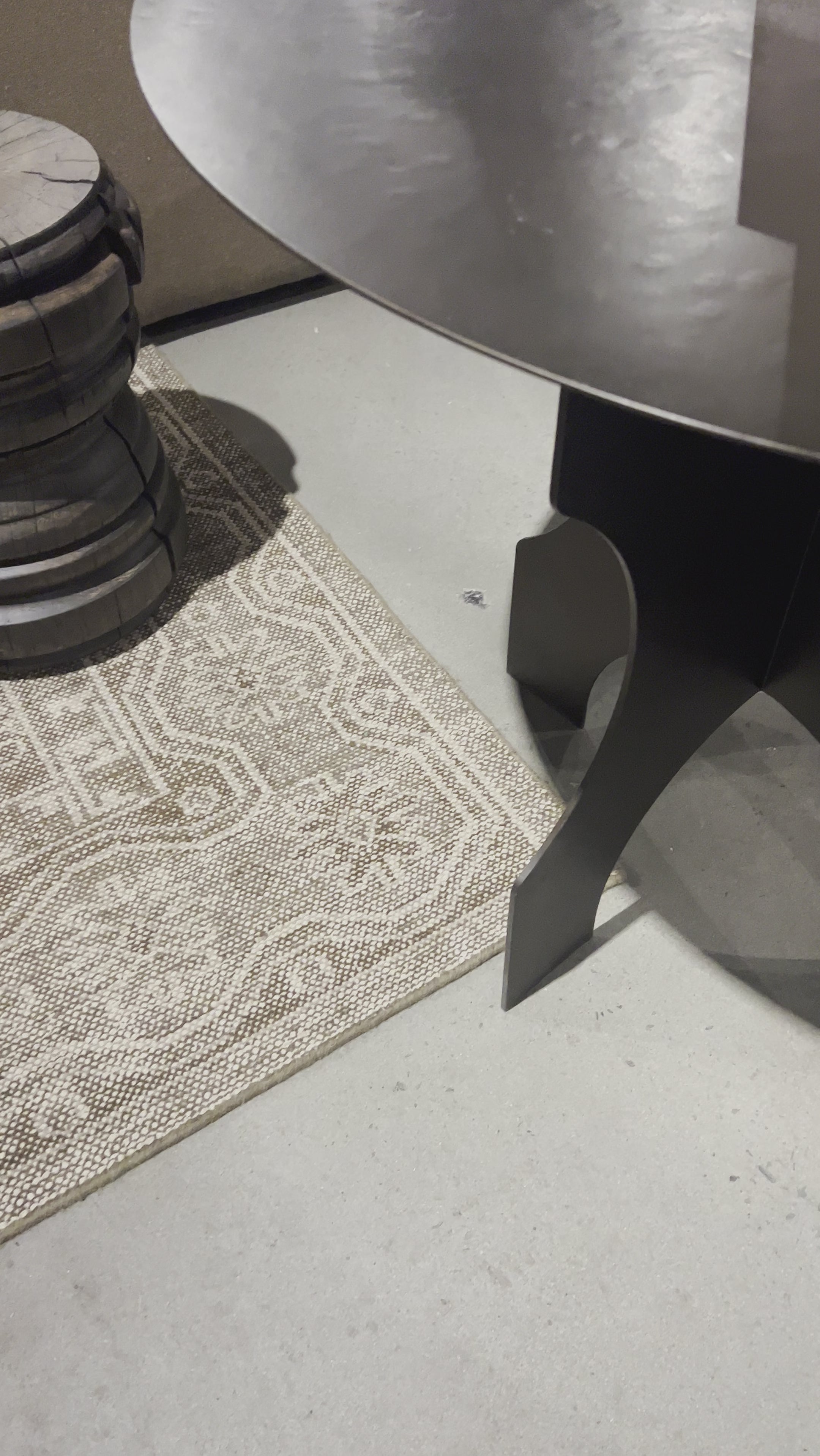 By the makers at Van Thiel, known for their antique-inspired pieces and hand-applied finishes. Solid iron with a textured bronze finish forms this unique, structured end table with industrial vibes.Overall Dimensions: 35.5"W x 35.5"L x 30"H Amethyst Home provides interior design, new home construction design consulting, vintage area rugs, and lighting in the San Diego metro area.