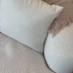 Organic curves with a dreamy French inspired boucle fabric -- the Clarissa sofa is an Amethyst favorite.  The sleek single seat cushion with firm back provides luxe comfort. Amethyst Home provides interior design, new home construction design consulting, vintage area rugs, and lighting in the Alpharetta metro area.