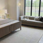 Dreamy woven panels is the perfect foundation for this warm, layered bed.  We love that this detail heavy look can make even the most sterile bedroom come to life. Amethyst Home provides interior design, new home construction design consulting, vintage area rugs, and lighting in the Scottsdale metro area.