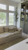 An Amethyst essential: dreamy feather top cushion covers a full upholstered frame.  Slipcovered in an ethereal white linen machine washable slipcover — made just for you in North Carolina. Amethyst Home provides interior design, new home construction design consulting, vintage area rugs, and lighting in the Salt Lake City metro area.