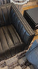Upholstered in dreamy "wolf" leather -- this sofa is the perfect blend of chocolate and grey tones.  Channeled leather makes for a structured, comfortable sit. Amethyst Home provides interior design, new home construction design consulting, vintage area rugs, and lighting in the Alpharetta metro area.
