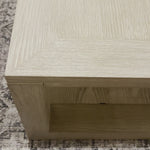 Made from bleached solid oak, a simply shaped coffee table brings a light, clean look to your living room. Lower shelving brings bonus storage and display of favorite books and more.Overall Dimensions: 67"W x 40"L x 15.75"H Amethyst Home provides interior design, new home construction design consulting, vintage area rugs, and lighting in the Kansas City metro area.