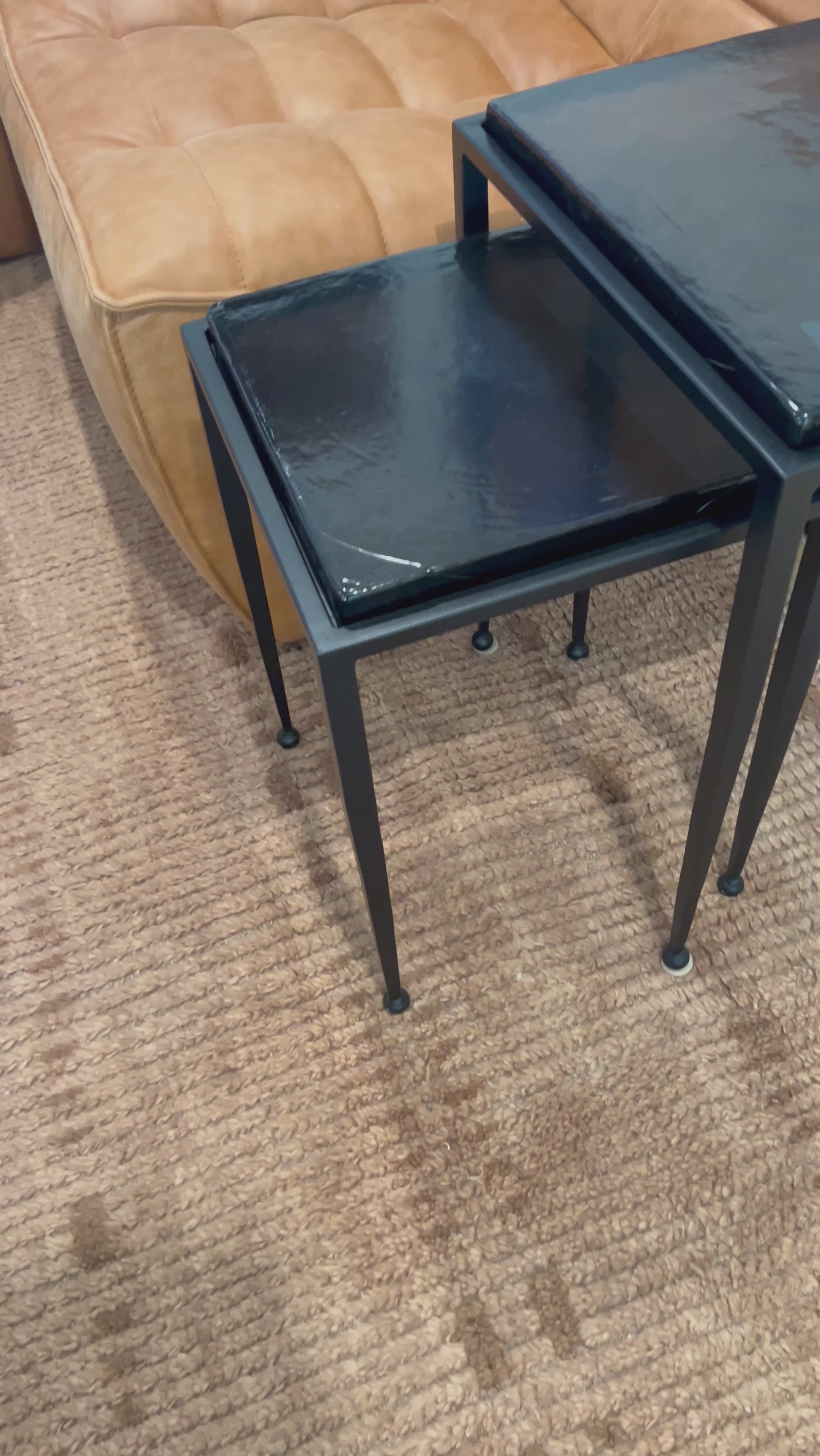 Embrace the mysterious with the Dexter smoked glass nesting tables.  Beautiful smoked glass gives a warm modern vibe while being practical.Overall Dimensions: 16.25"w x 16.25"d x 21.00"hWeight : 52.91 lbsMaterials : Cast Glass, Iron Amethyst Home provides interior design, new home construction design consulting, vintage area rugs, and lighting in the Winter Garden metro area.