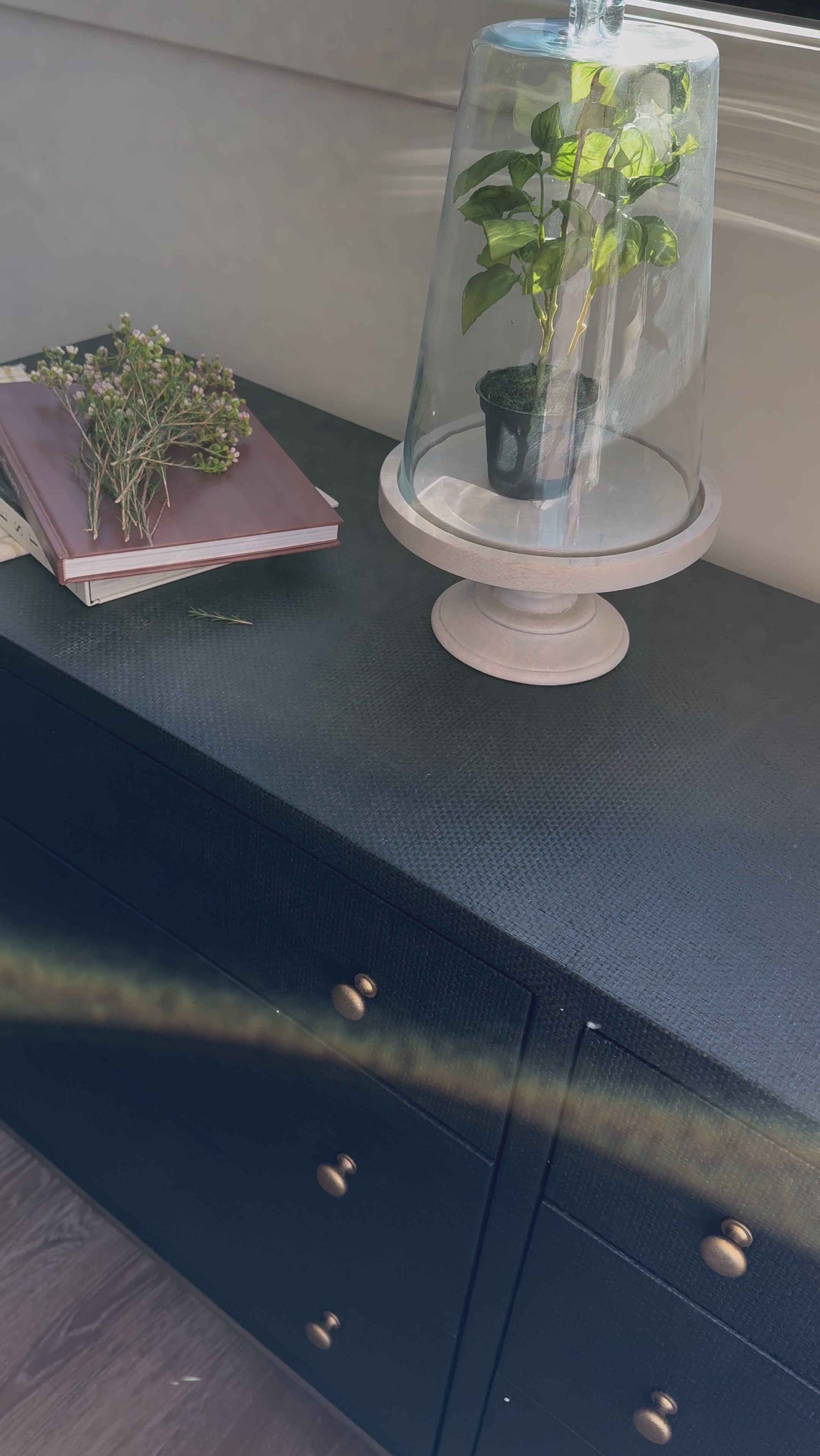 Woven black raffia offers a texture-driven take on bedroom storage. Antique brass-finished iron hardware adorns six spacious drawers, all supported by a solid mahogany base.Overall Dimensions: 62.00"w x 17.00"d x 34.00"hWeight : 181.22 lbsMaterials : Solid Mahogany, Sugar Palm, Iron Amethyst Home provides interior design, new home construction design consulting, vintage area rugs, and lighting in the Newport Beach metro area.
