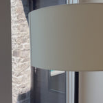 Paired with a slim, black-finished iron post, a tapered ceramic base is finished with a white reactive glaze, making each piece truly unique with subtle variations. An ivory linen shade keeps things looking light and airy. Amethyst Home provides interior design, new home construction design consulting, vintage area rugs, and lighting in the Dallas metro area.
