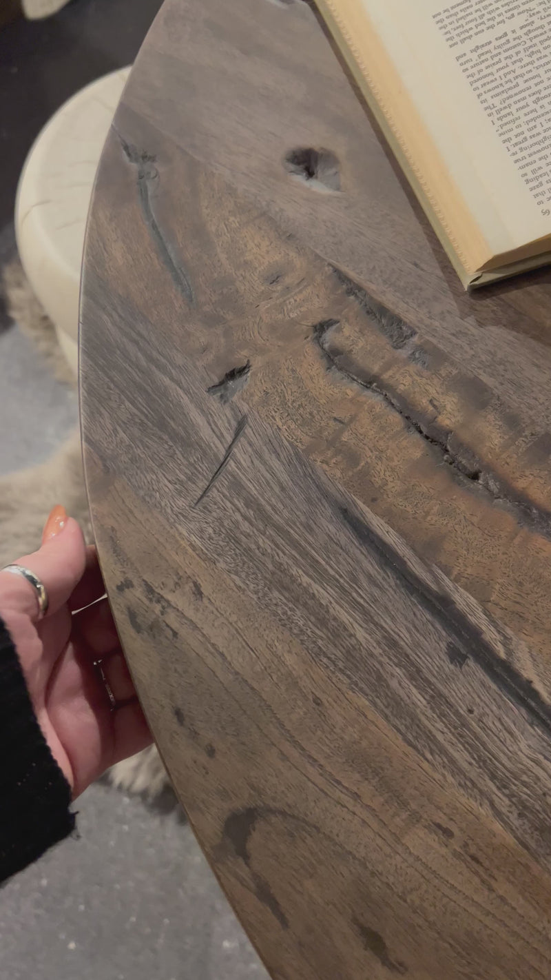 Inspired by Romanian sculptor Constantin, a classic pedestal table of mixed character woods works a heritage look into the home. Amethyst Home provides interior design, new home construction design consulting, vintage area rugs, and lighting in the Austin metro area.