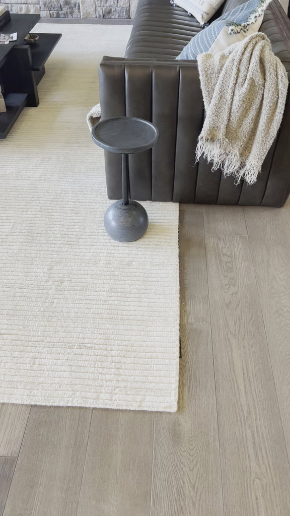 We love the abstract design of this Viola Black Marble Accent Table. Made from solid marble, the table brings an elegant feel to any space. Amethyst Home provides interior design, new home construction design consulting, vintage area rugs, and lighting in the Winter Garden metro area.