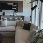 A new slipcovered version to a classic silhouette. A streamlined sectional is topped in a fully removable slipcover crafted from a soft linen/cotton/poly blend. Subtle texture throughout brings a casual coastal look and movement to the entire piece. Amethyst Home provides interior design, new home construction design consulting, vintage area rugs, and lighting in the Boston metro area.