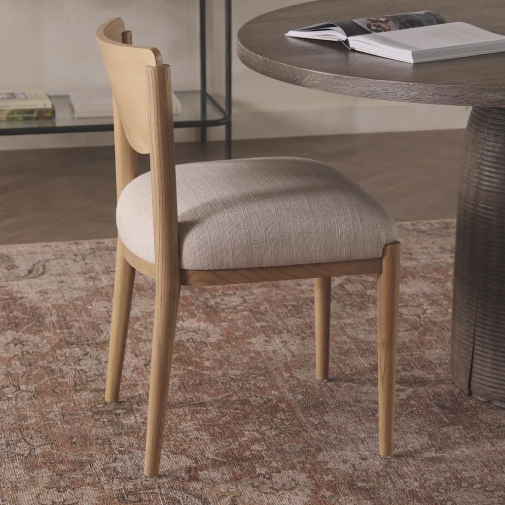 A celebration of simplicity. Natural nettlewood frames a comfortable linen-blend seat, while a subtle arc at the backrest's base softens clean, tapered lines. Performance fabrics are specially created to withstand spills, stains, high traffic and wear, ensuring long-term comfort and unmatched durability.Overall Dimensions: 20.25"w x 21.00"d x 32.25"hWeight : 16. Amethyst Home provides interior design, new home construction design consulting, vintage area rugs, and lighting in the Des Moines metro area.