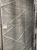 The Irvine Charcoal area rug from Loloi is hand-woven of wool, cotton, and polyester by artisans for a super comfortable rug. This rug is made from variegated yarns, fluffy bouclé texture, and has a twisted fringe border.  The Irvine rug lays a cozy foundation in a bedroom, living room, or family room for the perfect casual retreat. The rug has gorgeous tones of black, ivory, and pops of yellow for a cozy look. Crafted by Loloi for ED Ellen DeGeneres.  Hand Woven 81% Wool | 10% Cotton | 9% Polyester IRV-01 
