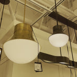 This Precision Small Pendant has a gorgeous white glass shade that brings a clean, bright light to any space. We'd love to see this hung over a kitchen sink, island, or other area.   Designer: Kelly Wearstler