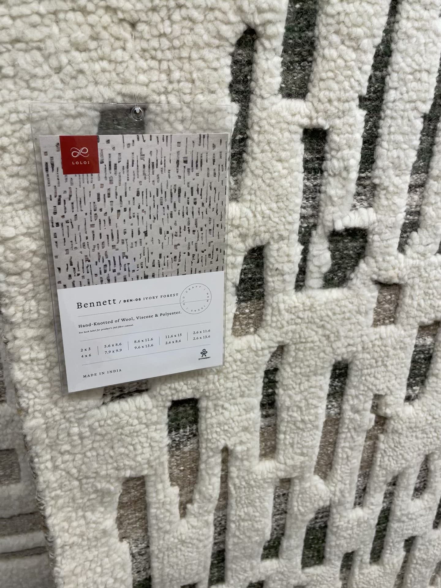 Dimensional yet soft, the Bennett Ivory / Charcoal Area Rug is hand-knotted of wool, viscose and polyester in India. Featuring a new carve like high-low pile, Bennett has an ivory base with abstract tonal designs. Plus, it's plush underfoot -- a great choice for your office, bedroom, or other medium traffic areas.   Hand Knotted 45% Wool | 32% Viscose | 17% Polyester | 6% Other Fibers Pile BEN-01 Ivory/Charcoal