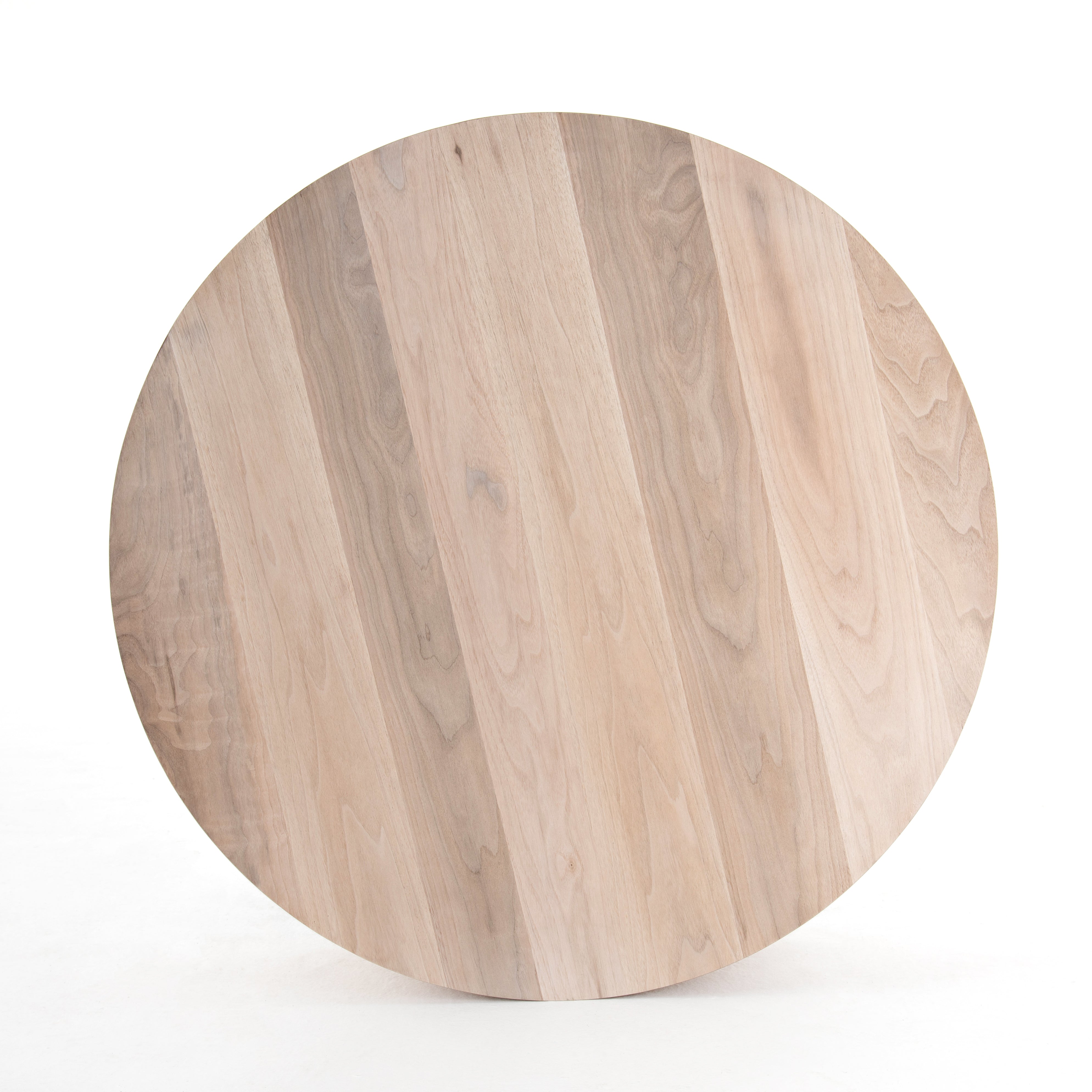 Stunning forces of nature are captured in the Hudson Coffee Table. We love how the palted primavera wood is hand-shaped into a cylindrical silhouette.   Overall Dimensions: 40"w x 40"d x 15"h  Materials: Yukas, Iron Materials: Iron, Primavera Materials: Iron, Thick Walnut Veneer