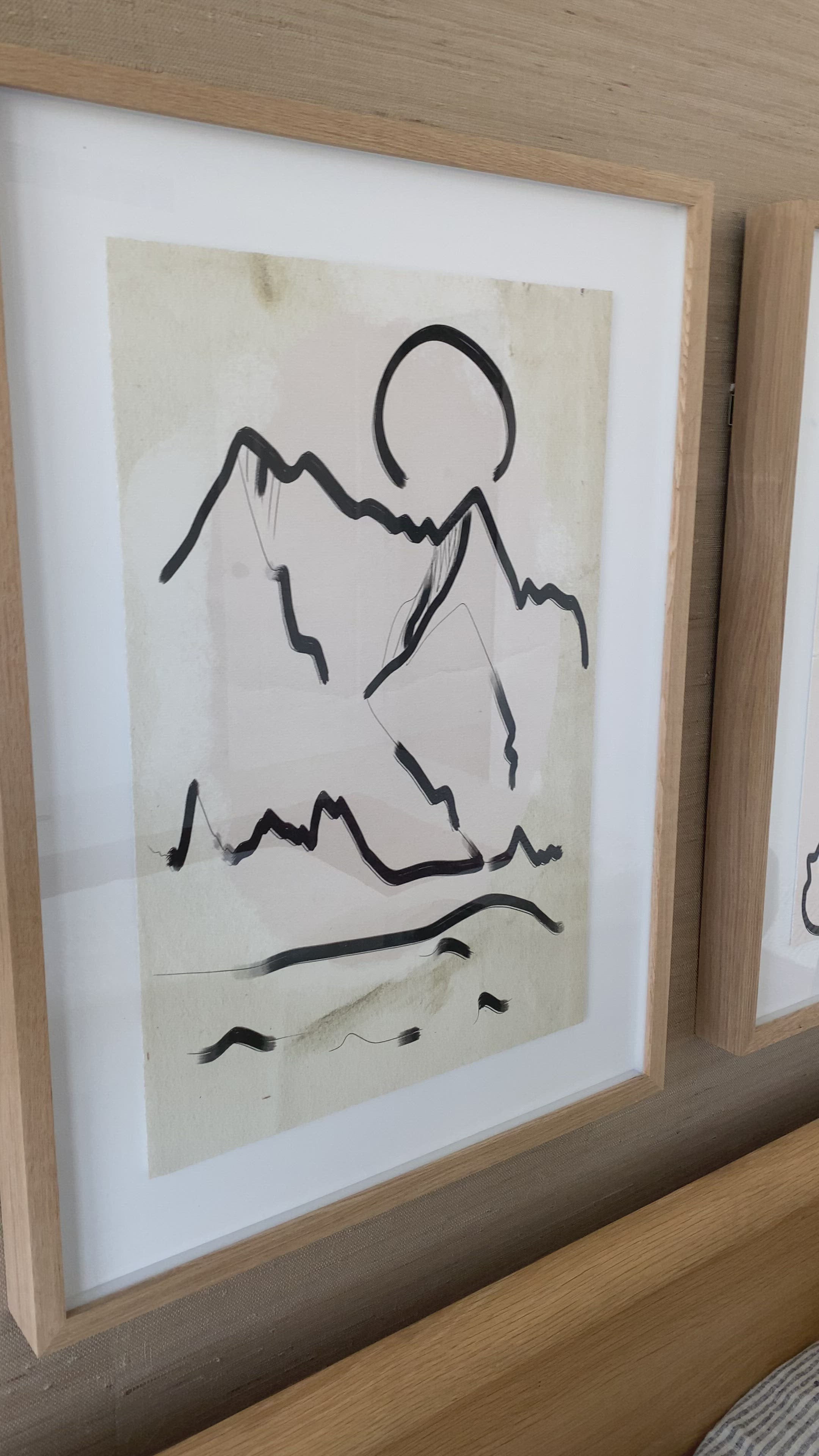 Load video: We love the clean contrast Mountain High II Art bings to a space. Original rendering by Bangkok-based art house Coup D&#39;Esprit, this is framed within vertical grain white oak for a museum-quality look.  Compete the look with Mountain High I, III &amp; IV!