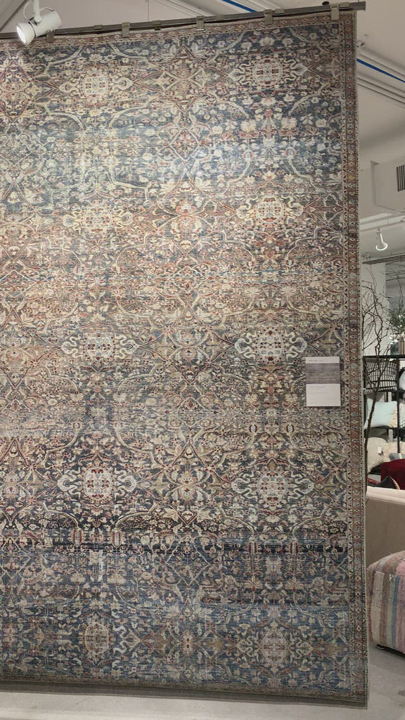 Durable, low pile, and soft underfoot, this rug is inspired by classic vintage and antique rugs. The Jules Chris Loves Julia Denim / Spice rug from Loloi features a beautiful vintage pattern and patina. The rug is easy to clean and maintain and perfect for living rooms, dining rooms, hallways, and kitchens!