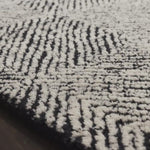 With stunning and delicate linear patterns, the Kopa Collection provides an energetic and fresh canvas for a low profile, long-lasting 100% wool rug. Each design is hand-tufted by skilled artisans in India. Crafted by Loloi for ED Ellen DeGeneres.  Hand Tufted 100% Wool India KO-01 ED Black/Ivory