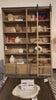 Five roomy shelves are ready to store favorite books and treasures, with smoked solid pine suited for any space. Removable ledges slant at an angle on each shelf, for even-better display of art and coffee table-size books, plus an optional slide ladder (for decorative use only) to complete the look.  Overall Dimensions: 35.50"w x 17.50"d x 98"h