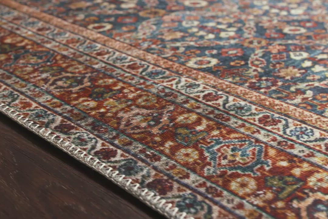 The Layla Blue / Spice area rug from Loloi captures the spirit of an old-world rug. Our customers love this rug because:   Perfect for families with kids and pets Very easy to clean and maintain Comes in big area rug sizes and as cute kitchen and hallway runners Looks gorgeous with the intricate pattern and patina Warms up any room with tones of blue, red, and ivory Power Loomed 100% Polyester LAY-09 Cobalt Blue/Spice Colors: Blue, Red, Ivory