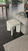 A minimalist dream, this Dante End Table - White Concrete is made from white-finished cast concrete with soft, chunky proportions. This would elevate the space for any living room or lounge area.    Overall Dimensions: 19.00"w x 19.00"d x 19.00"h