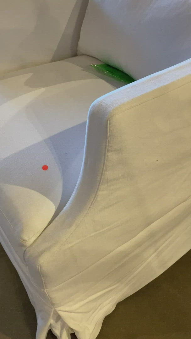 The slipcovered Amalia Chair from Cisco Brothers is one of our dreamiest seats!  Beautifully made in white 100% linen, this chair is equal parts casual and chic.  So comfortable and outside the ordinary -- perfect for traditional & coastal styles! Shown in a Grade K, Brevard Ivory fabric.  Overall dimensions: 29"w x 33"h x 34"d Seat Space: 24"w x 20"d x 20"h