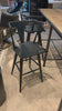 A fresh, bar-style take on mid-century Windsor seating is found in this Ripley Bar + Counter Stool - Black Oak. Featuring a bowed, sculptural silhouette and soft black finish to highlight the natural grain of weathered oak.