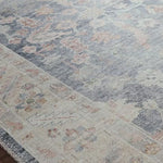 Featuring soft motifs in a carefully curated color palate of blue, yellow, red, and hints of orange, the Hathaway Denim / Multi area rug captures the essence of one-of-a-kind vintage or antique area rug at an attractive price.