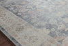 Featuring soft motifs in a carefully curated color palate of blue, yellow, red, and hints of orange, the Hathaway Denim / Multi area rug captures the essence of one-of-a-kind vintage or antique area rug at an attractive price.