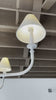 This Piaf Grande Chandelier from Visual Comfort has linen shades and brings a warm, classic look to any entry way, living room, or other large area.   Designer: Thomas O'Brien