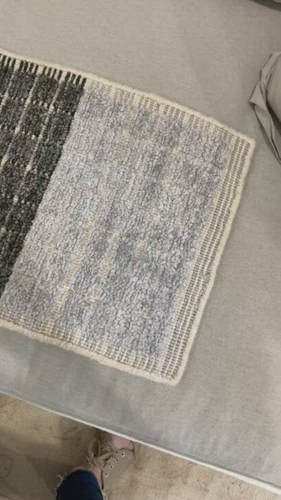 Load video: Modern and refined, the Beverly Stone rug by Loloi is hand-loomed by master artisans of viscose and wool pile. Clean lines and minimalist hues allow you to layer Beverly into any room.  Hand Loomed 45% Viscose | 26% Wool | 20% Cotton | 7% Polyester | 2% Other Fibers BEV-01 Stone