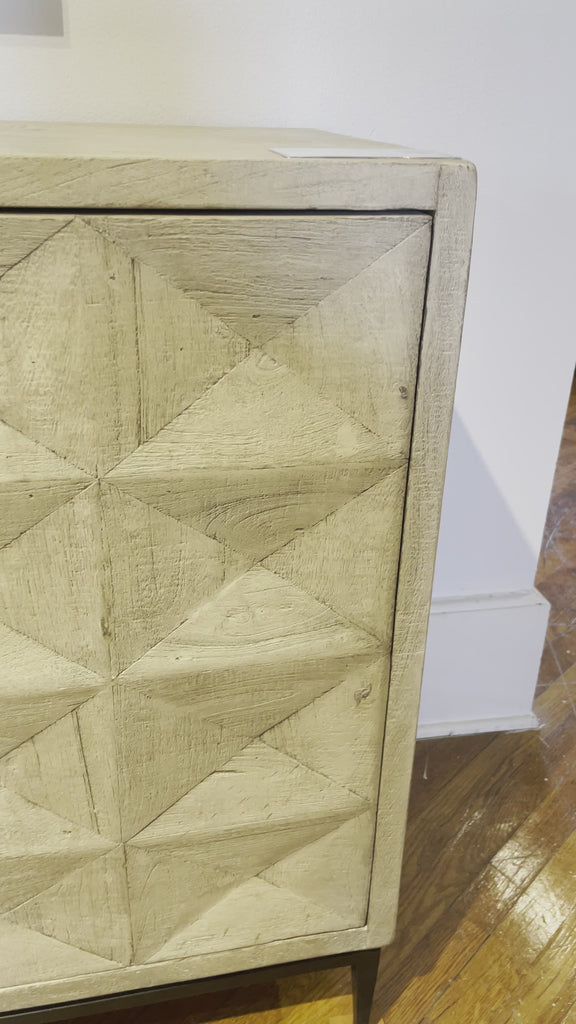 We love the form pattern on this Philip Sideboard. With four doors opening to two shelves, this can store all your extra dishware, linens, and other home goods that need an attractive storage space. 