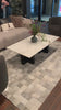 We love the legs of this Terrell Coffee Table - Raw Black. Finished in a raw black, uniquely angular cast aluminum legs support a rectangular tabletop of solid marble in a clean, polished white - a sleek, modern look to add in any living room or lounge area.   Overall Dimensions: 55.00"w x 29.00"d x 16.50"h