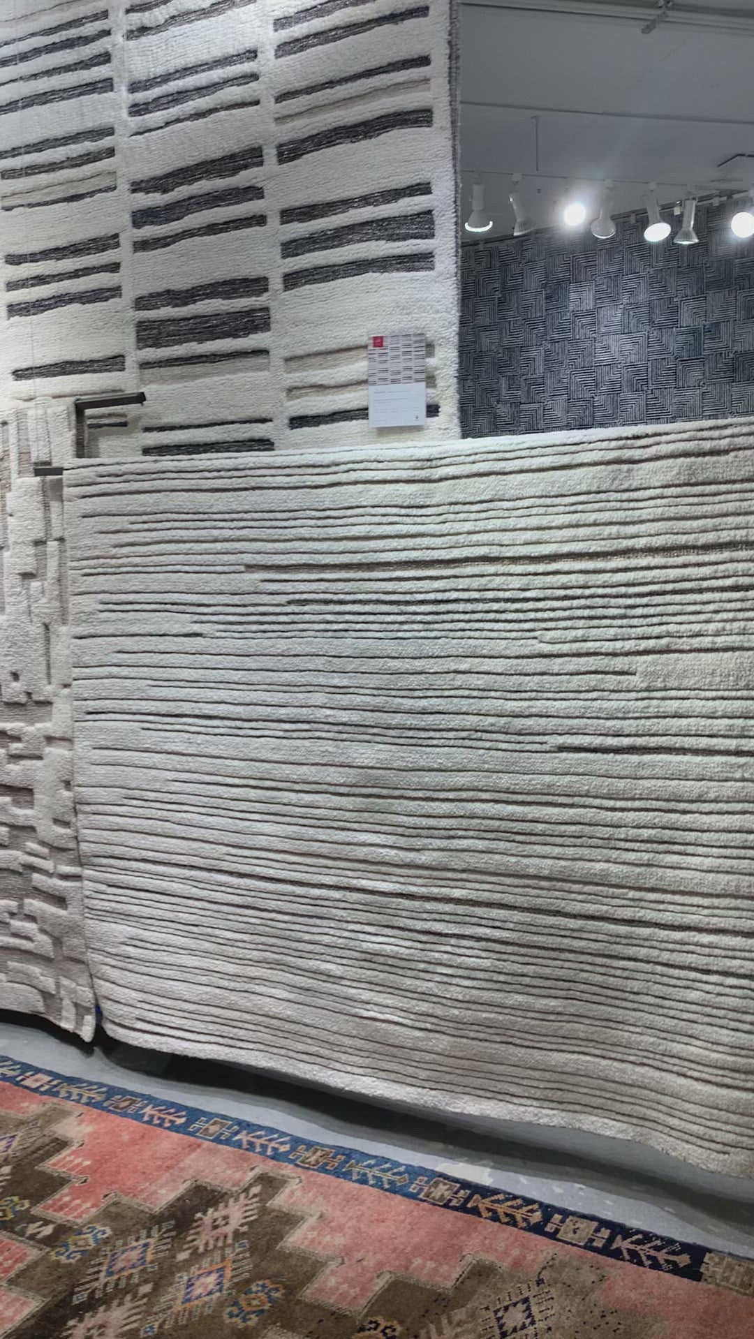Dimensional yet soft, the Bennett Ivory / Pebble Area Rug is hand-knotted of wool, viscose and polyester in India. Featuring a new carve like high-low pile, Bennett has an ivory base with abstract tonal designs. Plus, it's plush underfoot-- a great choice for your office, bedroom, or other medium traffic areas.   Hand Knotted 45% Wool | 32% Viscose | 17% Polyester | 6% Other Fibers Pile BEN-04 Ivory/Pebble