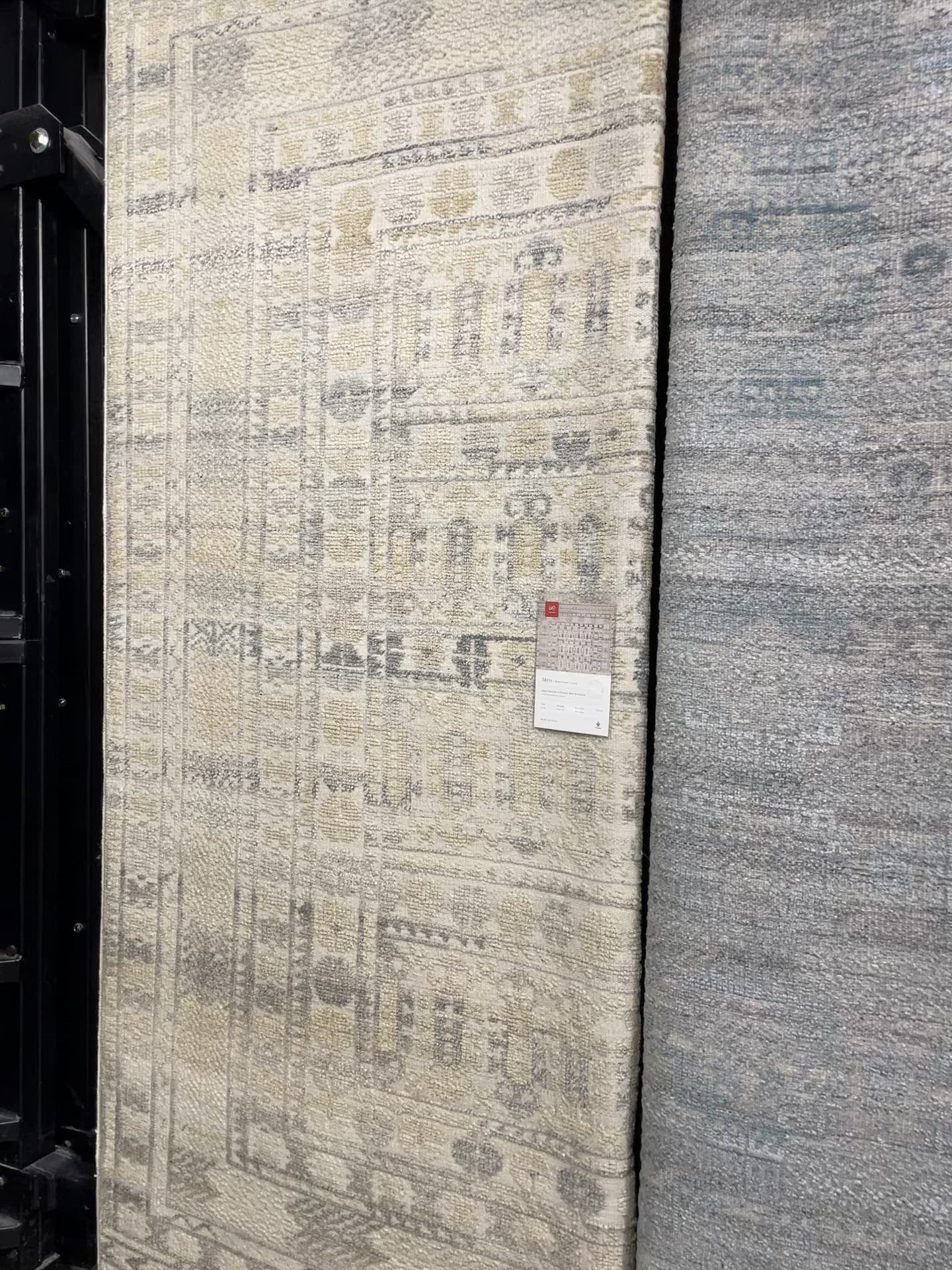 The Idris Ivory/Taupe area rug from Loloi is meticulously hand-knotted of viscose and wool. You will love this rug because the rug is:  Perfect for entryways, living rooms, and bedrooms Easy to clean and maintain Gorgeous with the intricate pattern and patina Warms up any room with the high / low pile Hand-Knotted 70% Viscose | 30% Wool ID-04 Ivory/Taupe