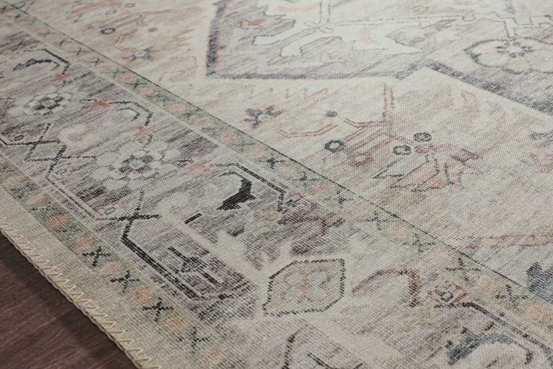 Load video: Featuring soft motifs in a carefully curated color palate of ivory, blue, green, and hints of purple, the Hathaway Multi / Ivory area rug captures the essence of one-of-a-kind vintage or antique area rug at an attractive price.