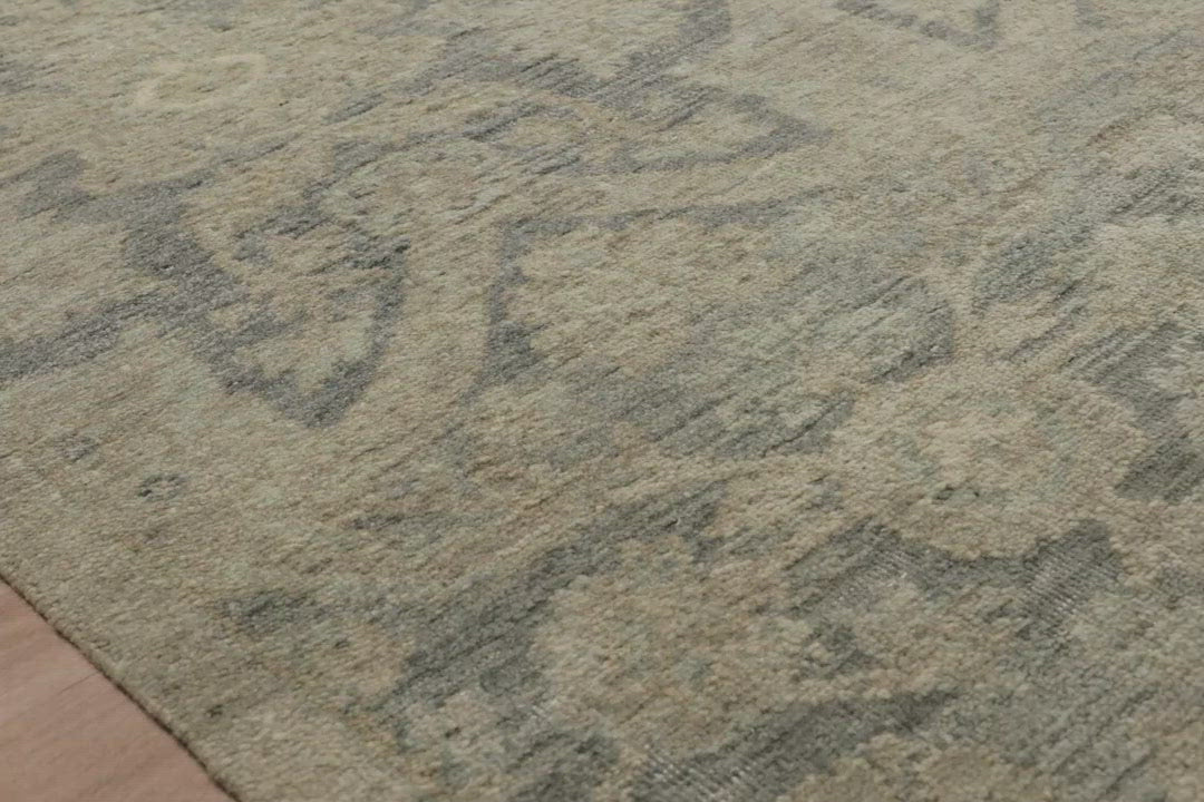 The Legacy Storm rug from Loloi is hand-knotted, refined, yet versatile for any home. The Legacy rug is deliberately distressed and sheared down to an extra low pile of 100% wool, creating a patina usually only imparted through decades of wear.  This rug features: - Beautiful vintage look and patina - Extra low pile - Easy to clean and maintain - Perfect for living and dining rooms, hallways, and extra large spaces  Hand-Knotted 100% Wool LZ-02 Storm