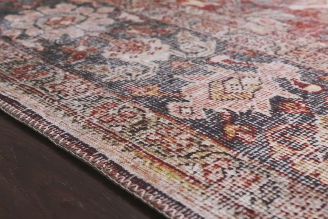 Load video: The Layla Collection is traditional and timeless, with a beautiful lived-in design that captures the spirit of an old-world rug. This traditional power-loomed rug is crafted of 100% polyester with a classic and sophisticated color palette and subtle patina.  Power Loomed 100% Polyester LAY-02 Spice/Marine