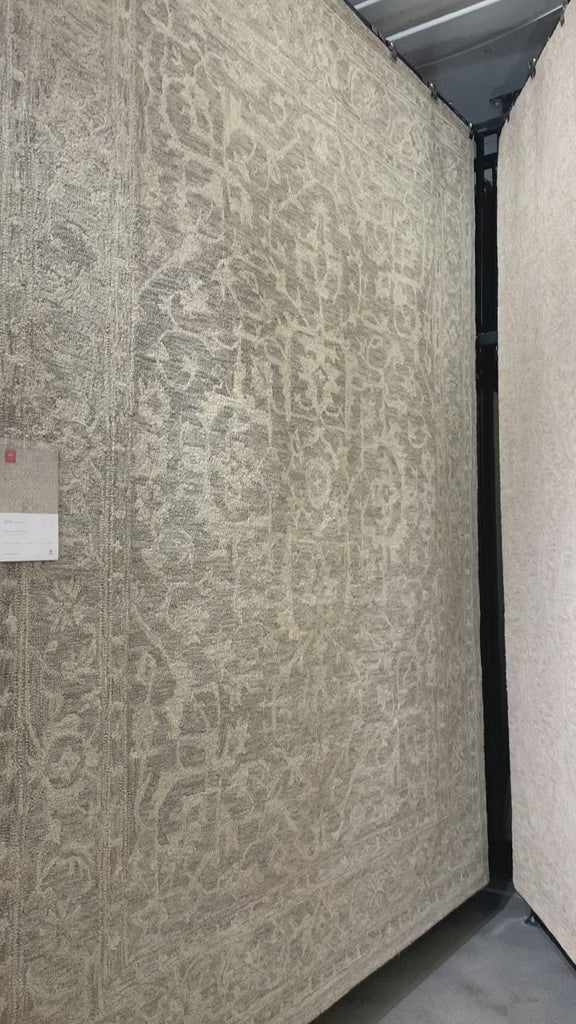 Finely hooked of 100% wool, the carefully crafted Loloi Lyle Stone Area Rug, or LK-02, is acclaimed for its soft texture and muted color range. Each piece showcases space-dyed wool, which lends a subtle gradation of hues throughout the traditional motifs. 