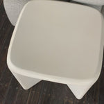 A minimalist dream, this Dante End Table - White Concrete is made from white-finished cast concrete with soft, chunky proportions. This would elevate the space for any living room or lounge area.    Overall Dimensions: 19.00"w x 19.00"d x 19.00"h