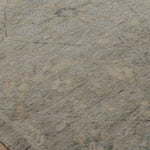 The Legacy Stone rug from Loloi is hand-knotted, refined, yet versatile for any home. The Legacy rug is deliberately distressed and sheared down to an extra low pile of 100% wool, creating a patina usually only imparted through decades of wear.  This rug features: - Beautiful vintage look and patina - Extra low pile - Easy to clean and maintain - Perfect for living and dining rooms, hallways, and extra large spaces  Hand-Knotted 100% Wool LZ-05 Stone 