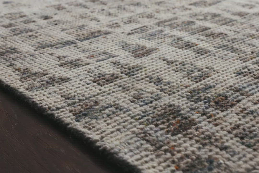 Load video: Hand-knotted in India of 100% wool, the Amara Natural/Ocean Area Rug creates a casual yet refined vibe with high-end appeal. Showcase in your living room, bedroom, entryway, or other high traffic area.   Hand Knotted 100% Wool AMM-07 Natural/Ocean