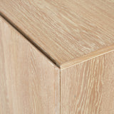 We love the grained matte finish on this Mika Washed Oak Veneer Dining Sideboard. The shelves make this the perfect sideboard for a functional, modernly attractive piece to add to your dining room  Size:  72.00"w x 16.00"d x 30.00"h Materials: Oak Veneer