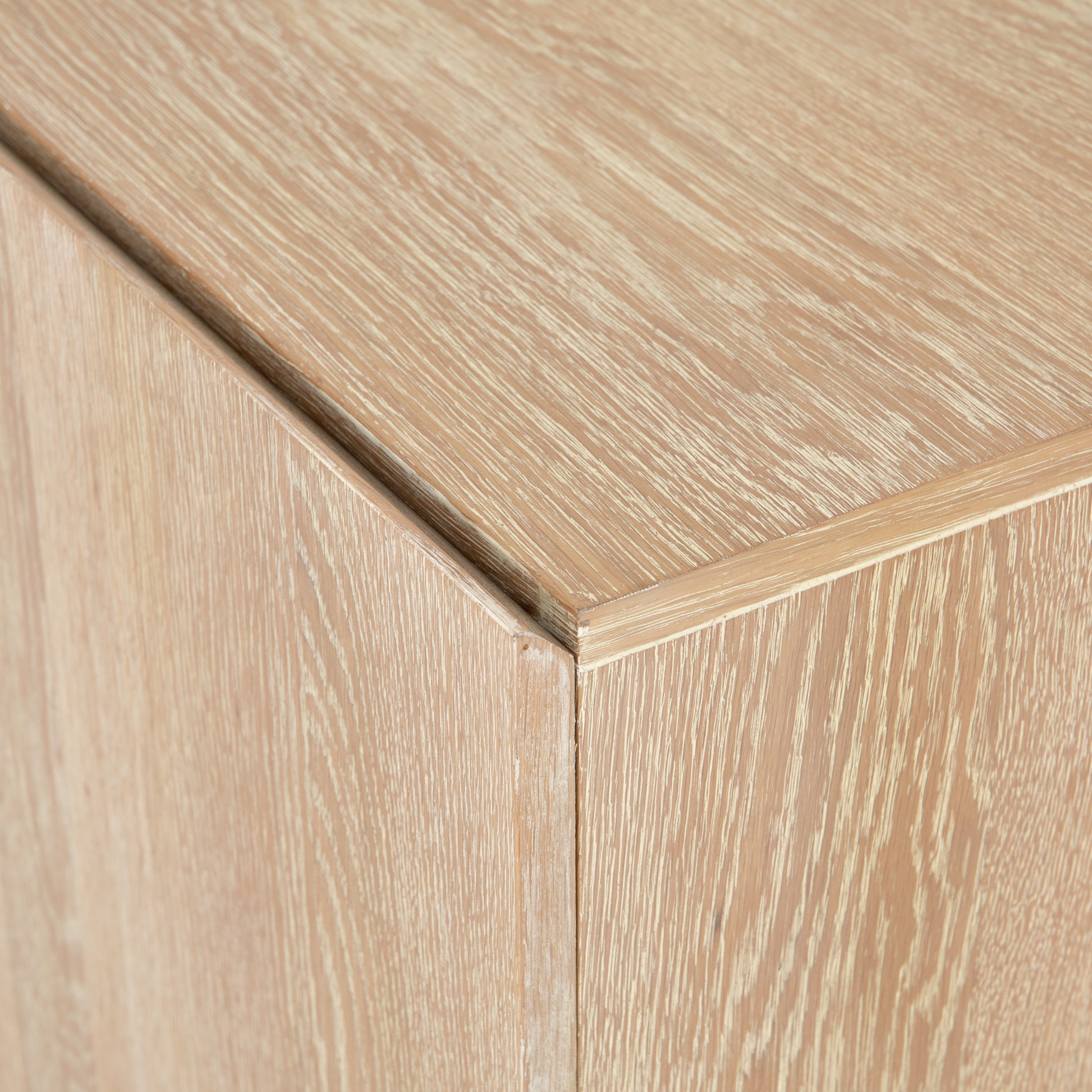 We love the grained matte finish on this Mika Washed Oak Veneer Dining Sideboard. The shelves make this the perfect sideboard for a functional, modernly attractive piece to add to your dining room  Size:  72.00"w x 16.00"d x 30.00"h Materials: Oak Veneer
