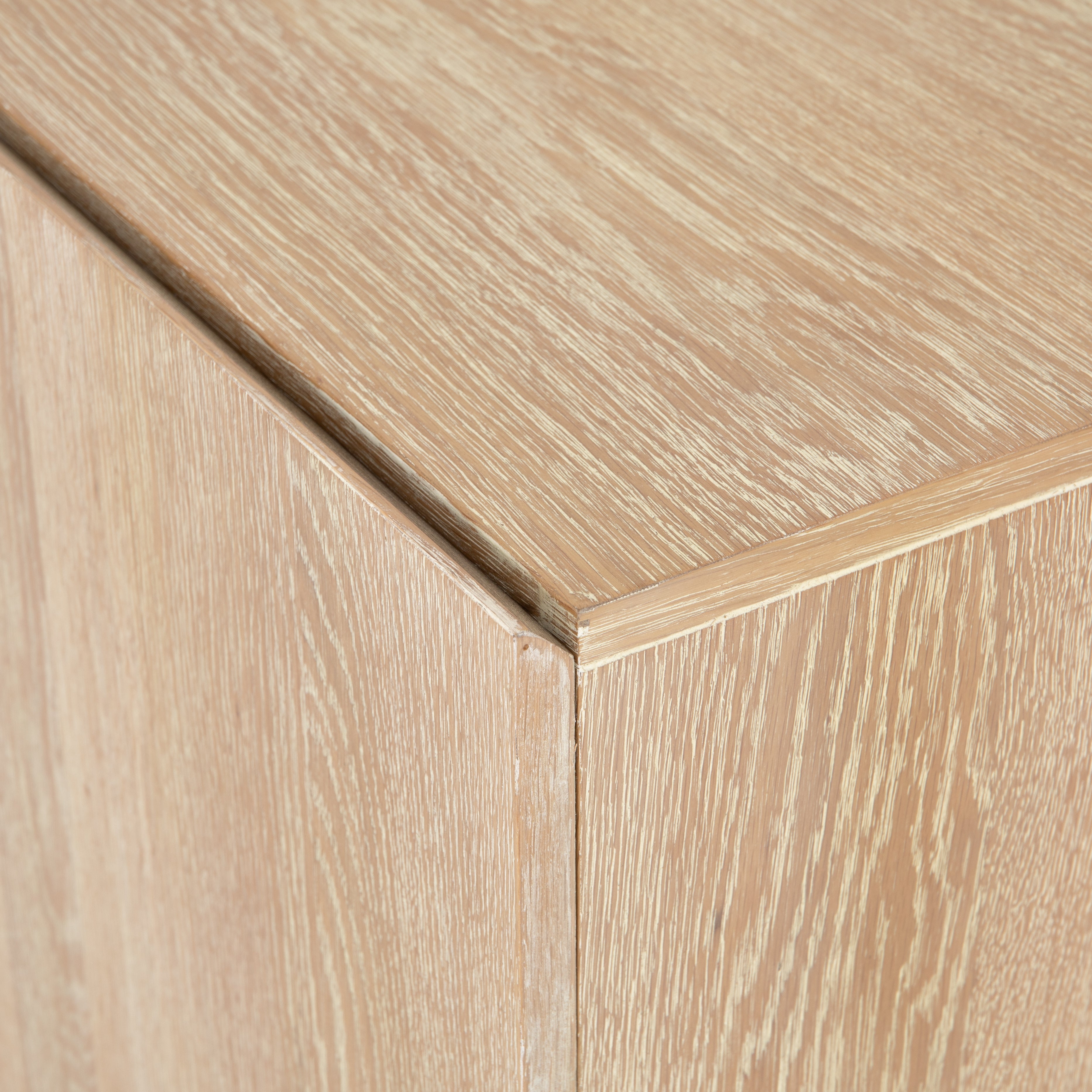 We love the grained matte finish on this Mika Washed Oak Veneer Dining Sideboard. The shelves make this the perfect sideboard for a functional, modernly attractive piece to add to your dining room  Size:  72.00"w x 16.00"d x 30.00"h Materials: Oak Veneer